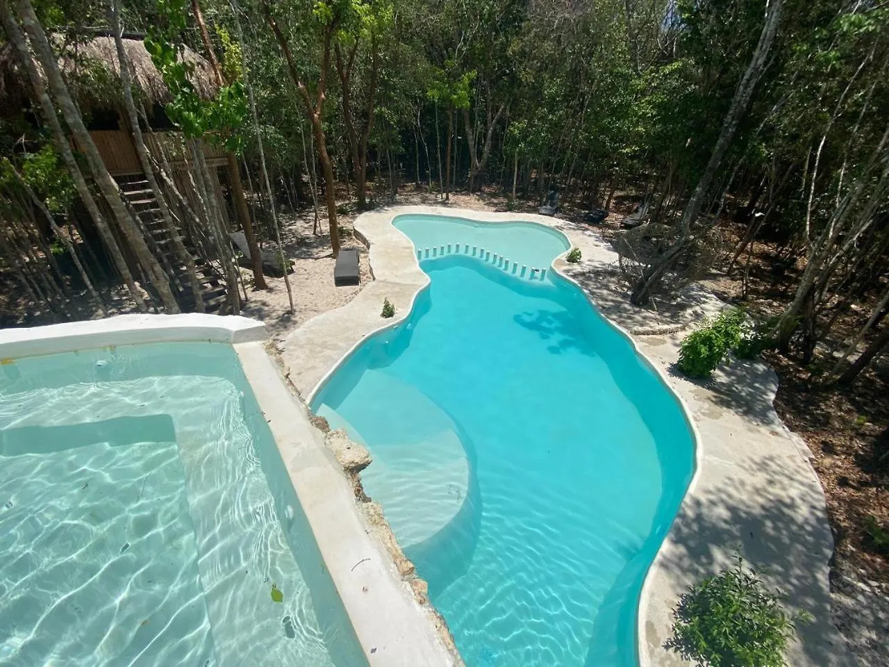 Aldea Maya-Ha Cabañas con cenotes Puerto Morelos